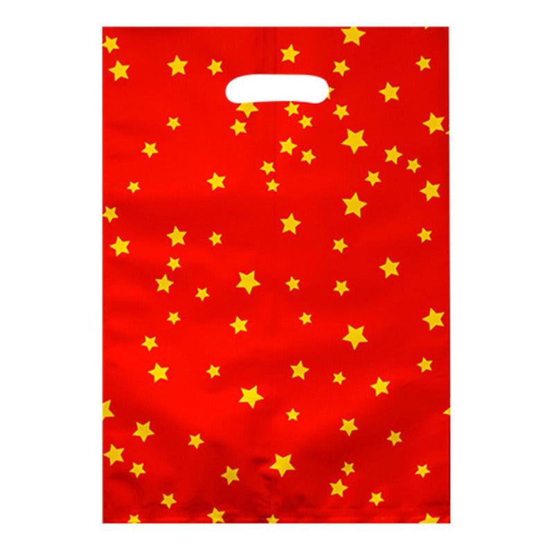 Bolsa metalizada roja con diseño de estrellas doradas.