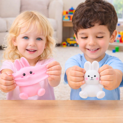 Conejitos Pascua 11cm Squishy Antiestrés Rosado y Blanco niños jugando - Louicid